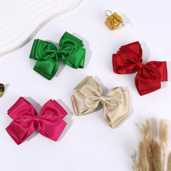 CN bow in party setting complementing dress and festive styling