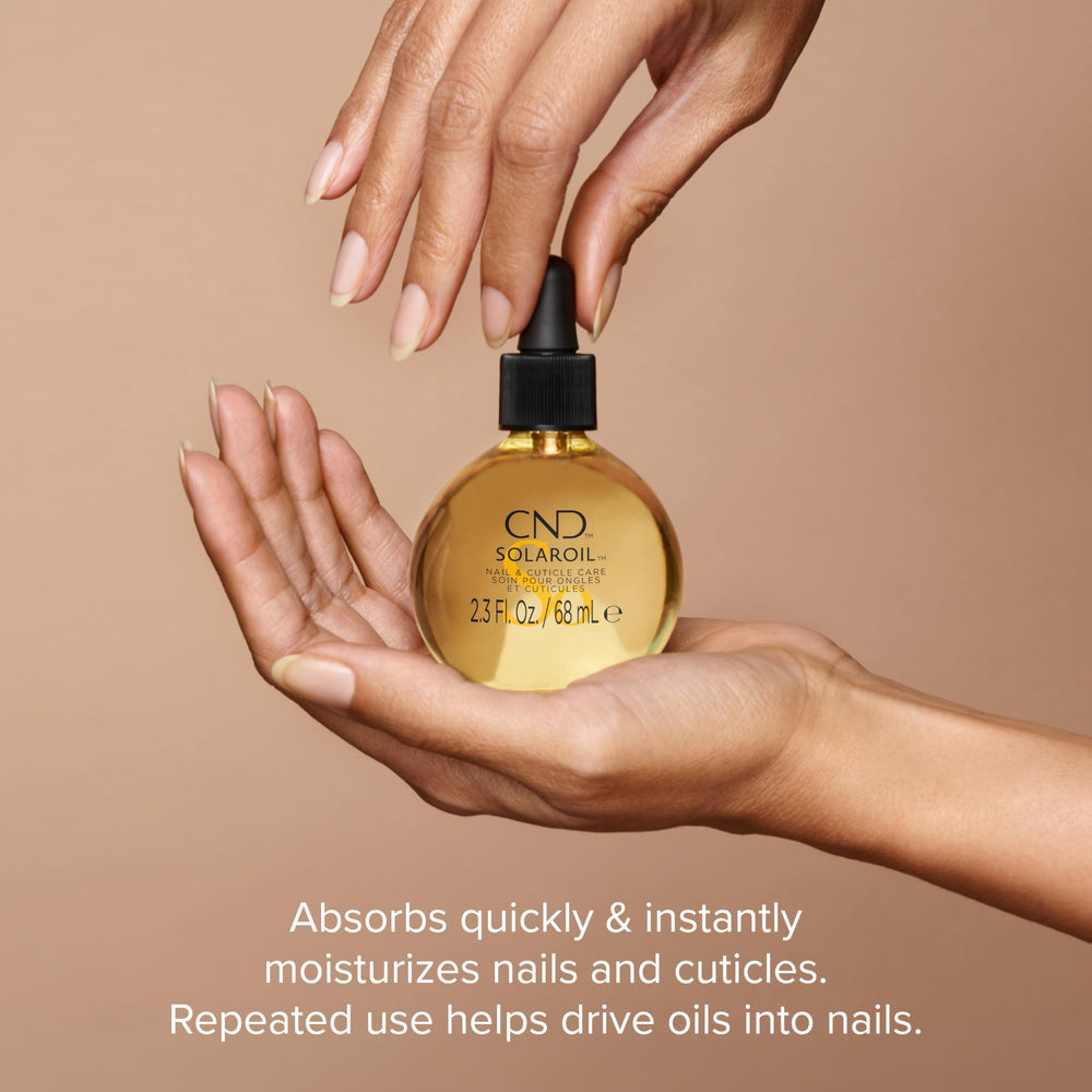 CND SolarOil drop on nail demonstrating quick absorption and softening benefit