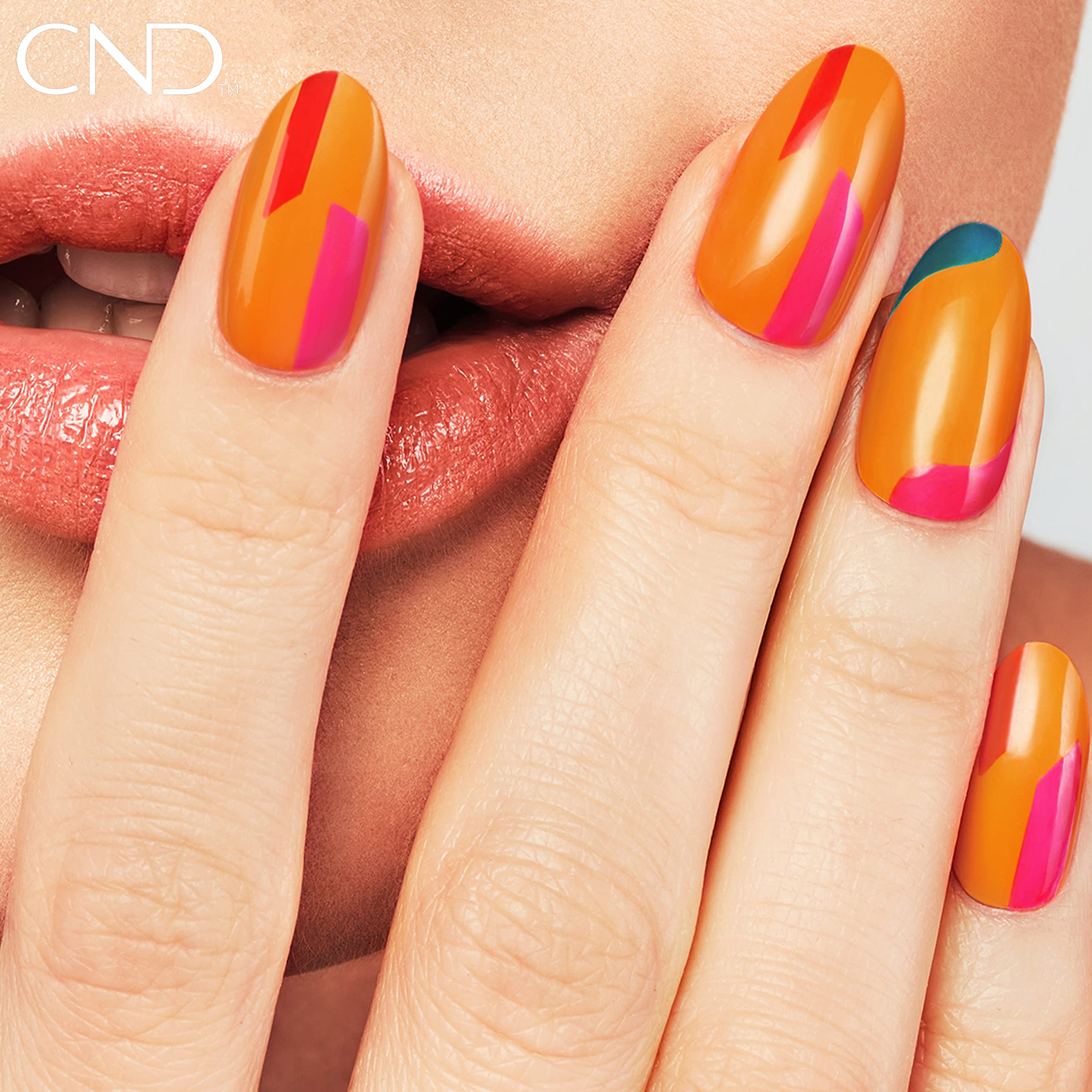 CND Vinylux manicured hands with summer outfit showing color versatility