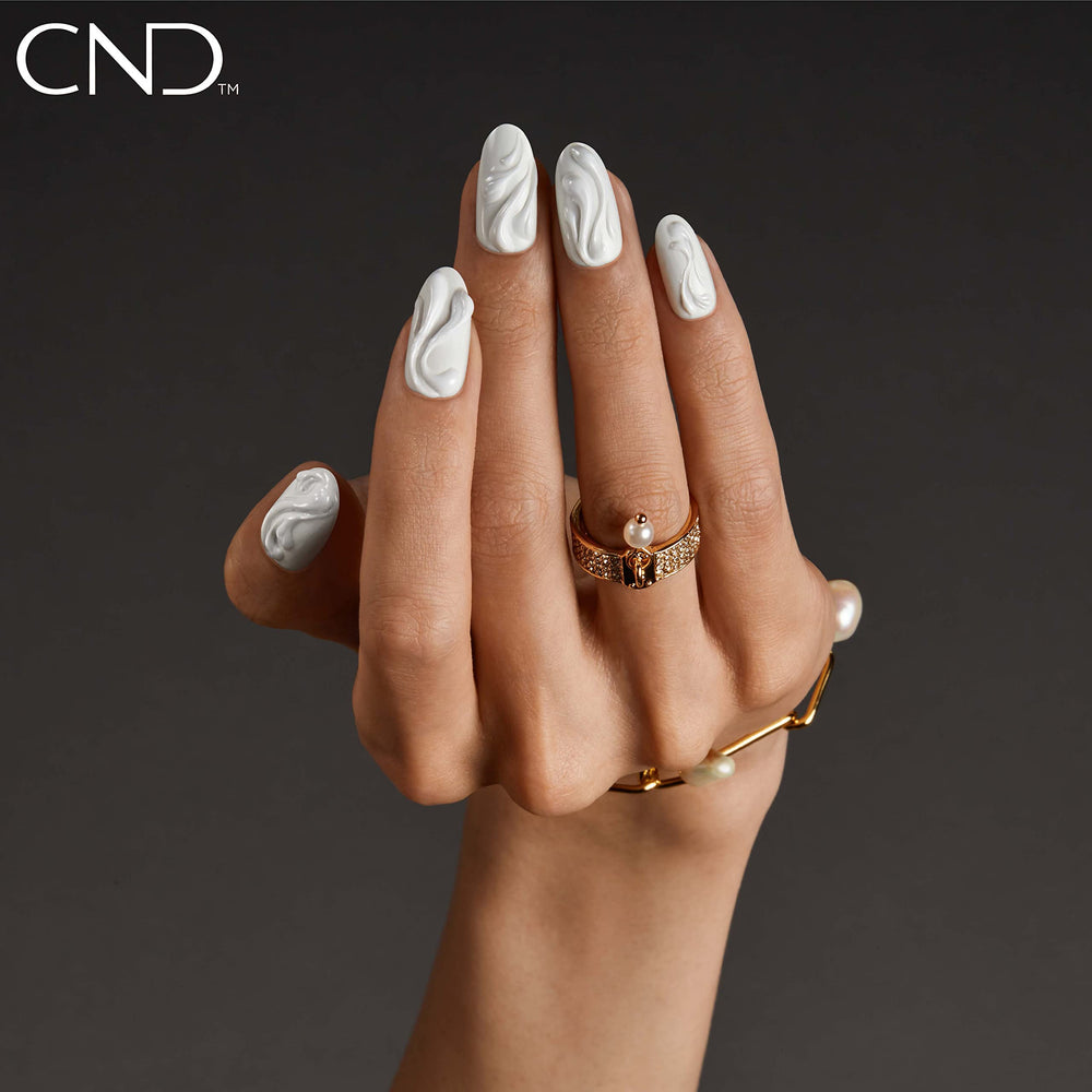 CND Vinylux Studio White swatch on toe showing versatile use benefit