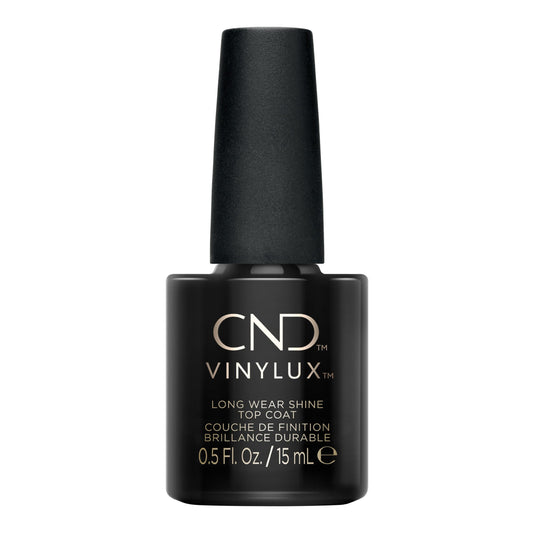 CND Vinylux brush applying top coat for smooth coverage and fast application