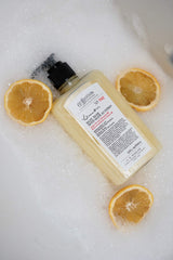 C. O. Bigelow two bottles on sink reinforcing everyday kitchen or bathroom placement