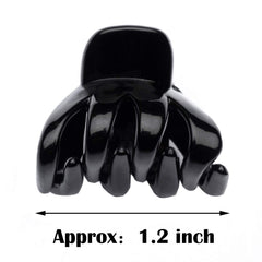 Cobahom clips held in palm demonstrating compact 1.2-inch size benefit