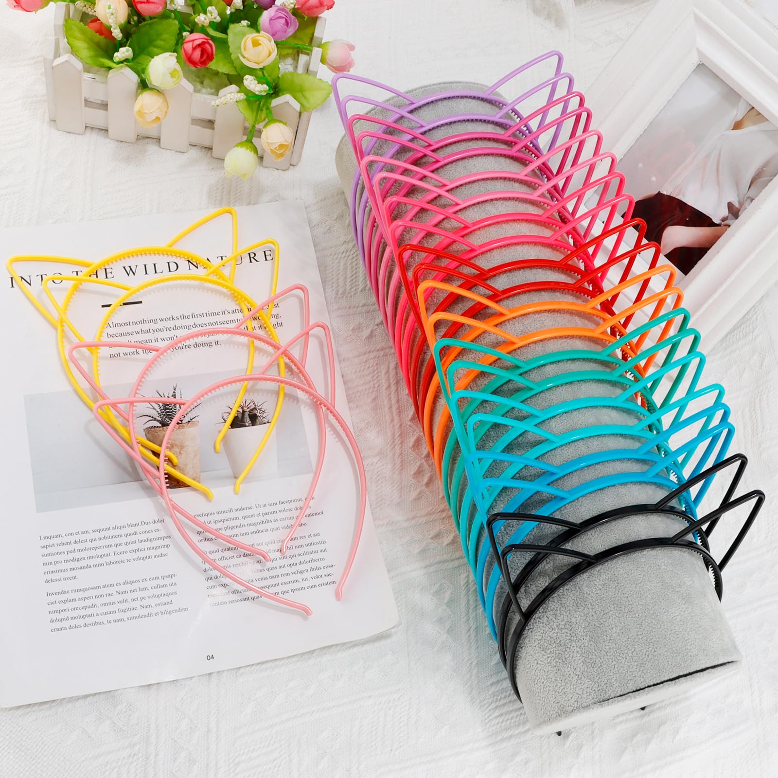 COCIDE headband beside ruler showing compact 11.5x14 cm size
