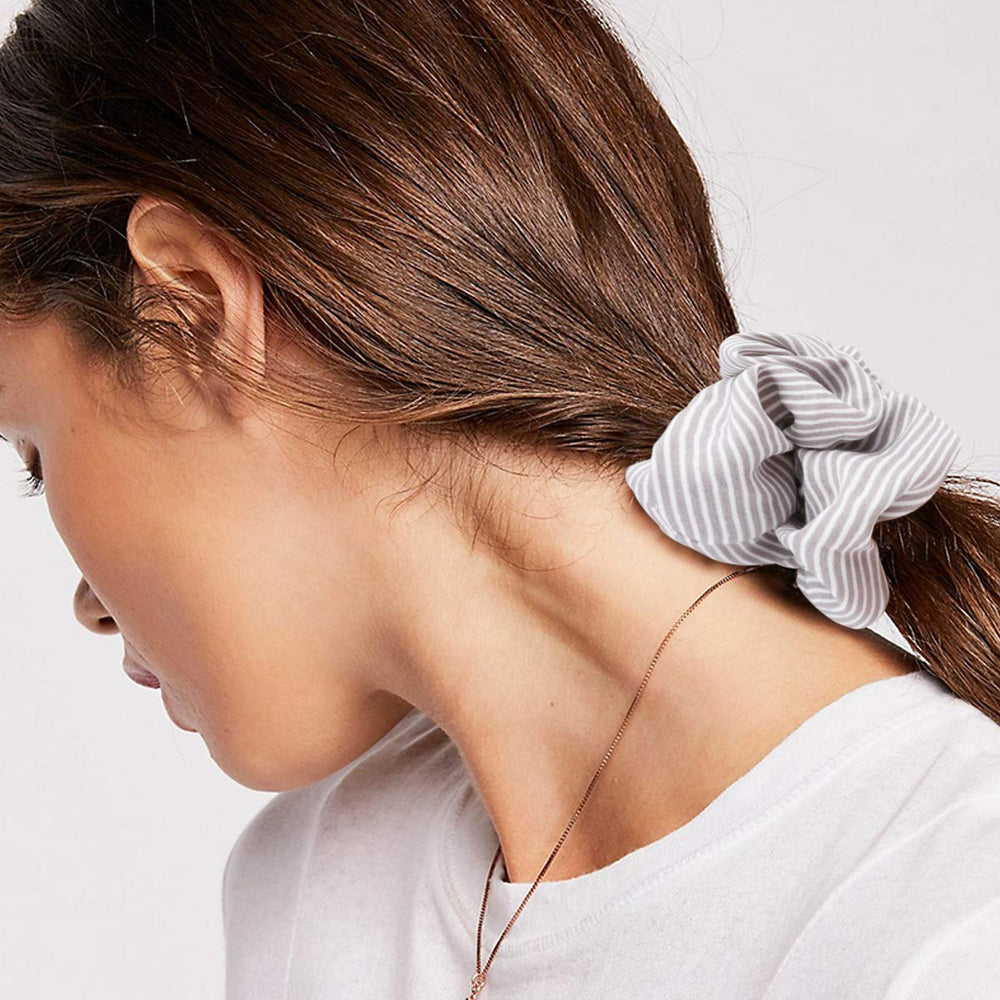 COCIDE stretched scrunchie exposing elastic core for strong hold