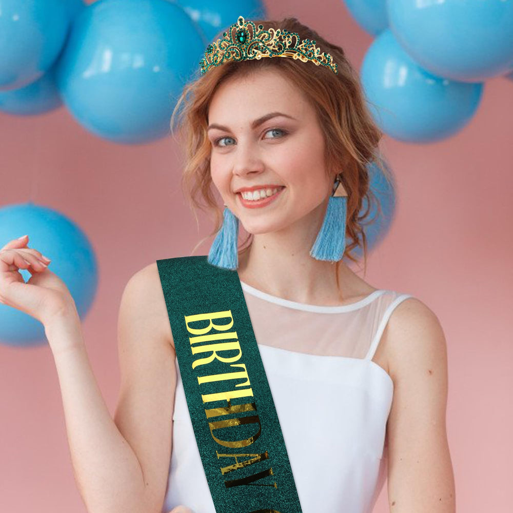 COCIDE tiara close-up highlighting rhinestones and green accents for striking shine