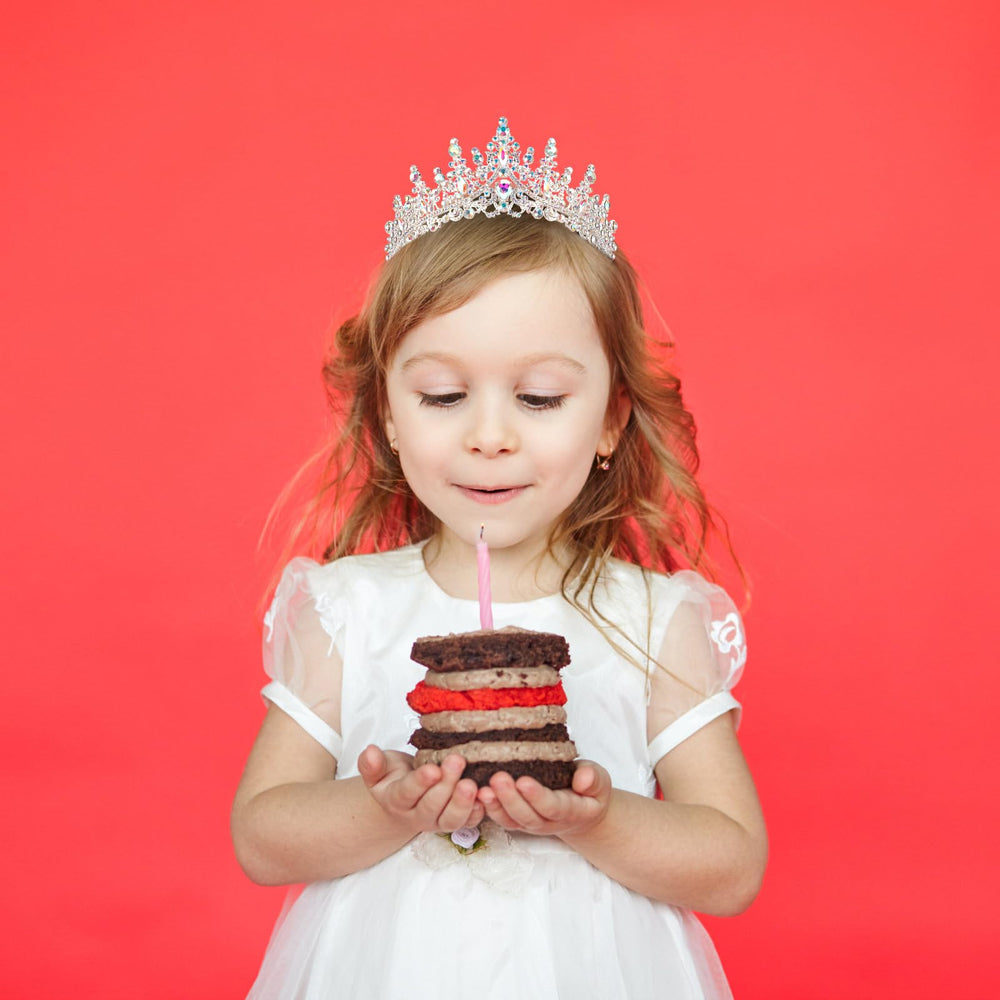 COCIDE model wearing sash and tiara at party showing instant celebratory style boost