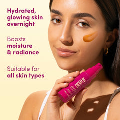 Coco & Eve bottle next to fingers to show compact travel-friendly size