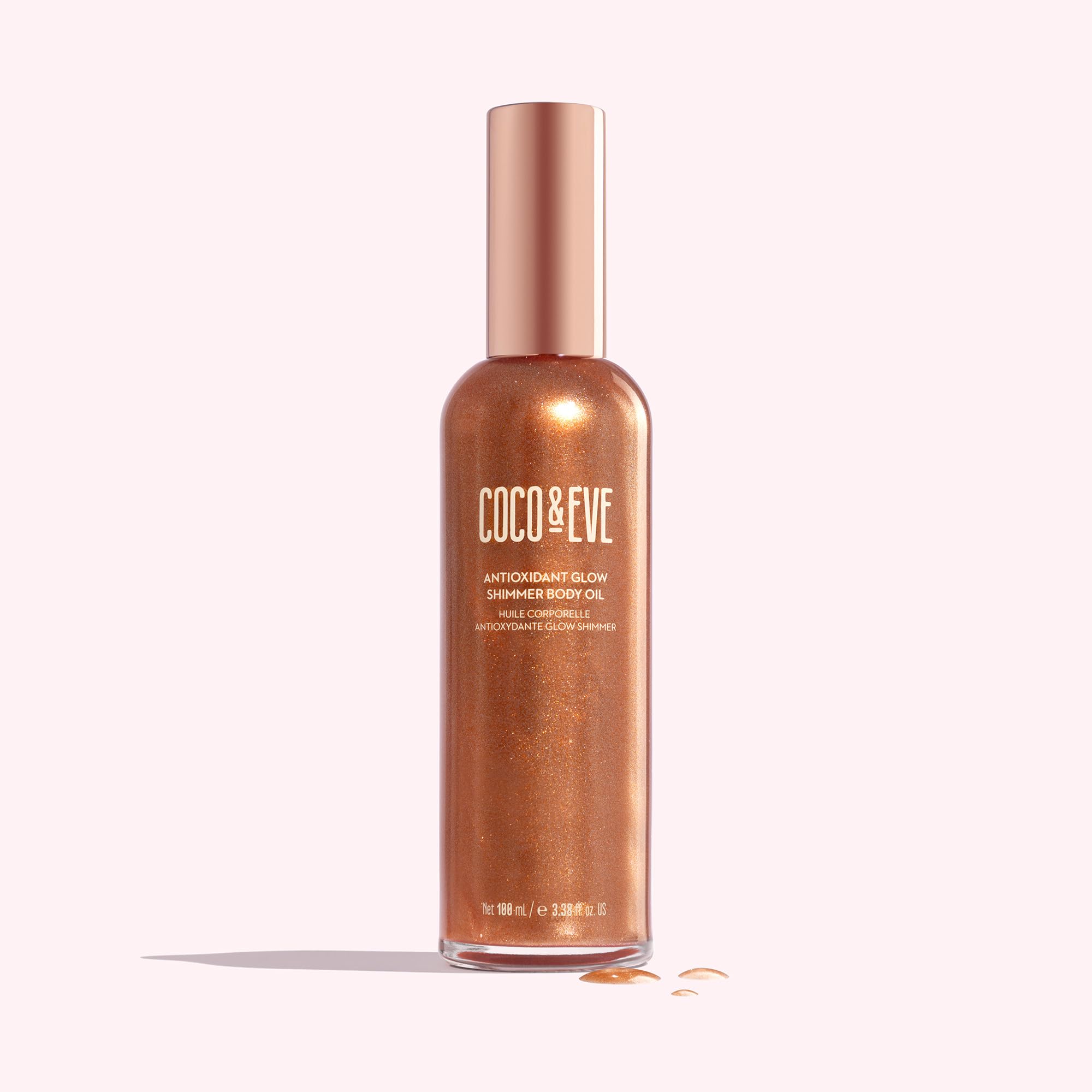 Coco & Eve close-up texture of oil showing fine pearlescent minerals and glow