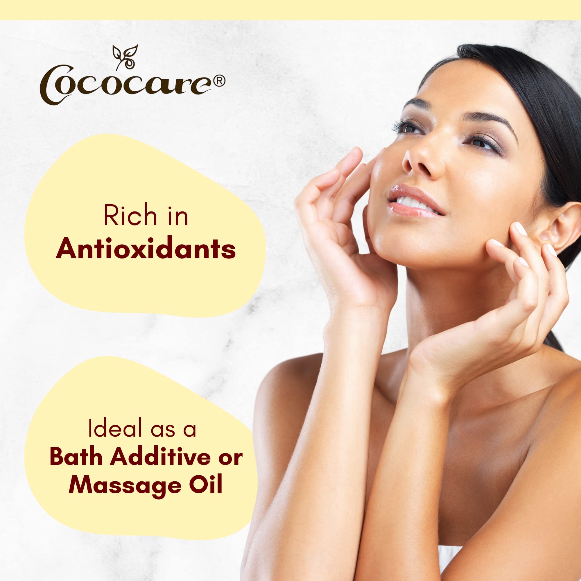 COCOCARE pouring oil into hand demonstrating easy spread and smooth glide