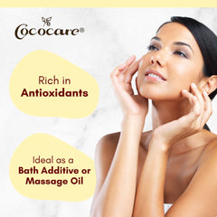 COCOCARE pouring oil into hand demonstrating easy spread and smooth glide