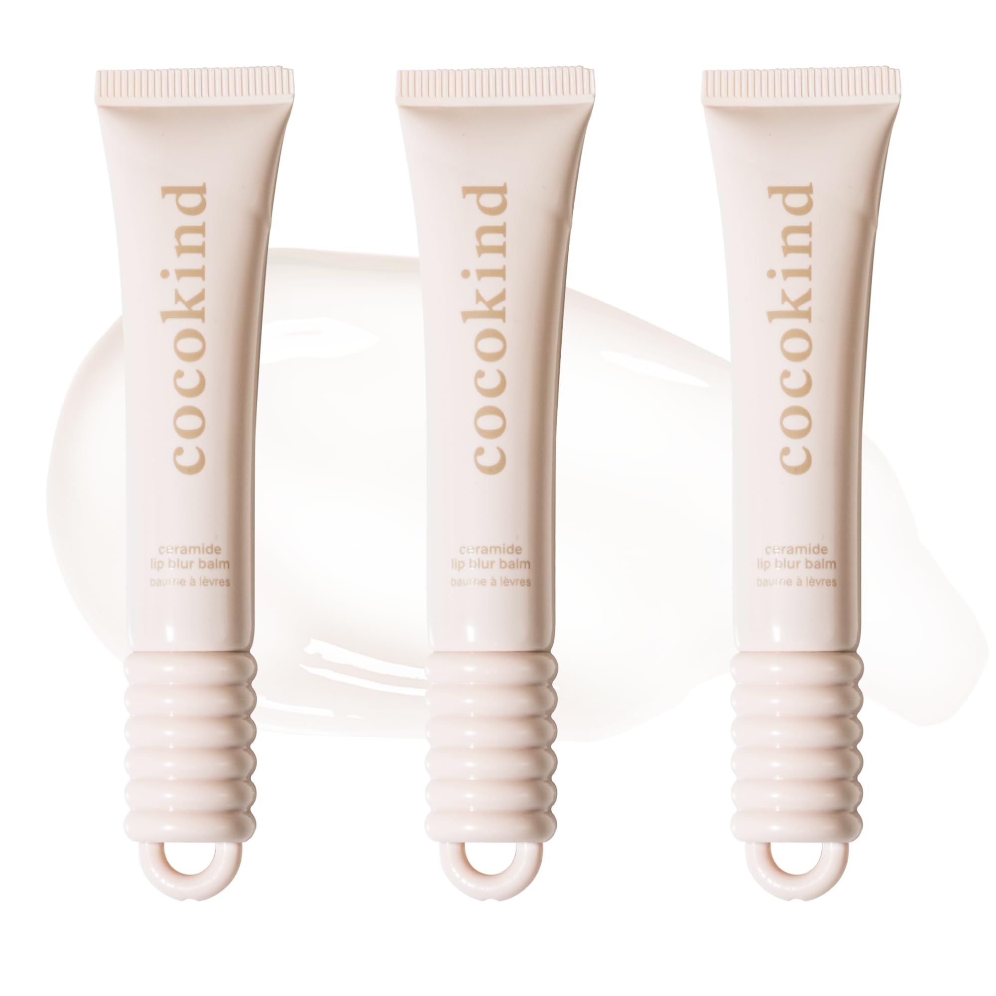 Cocokind lip blur balm front packaging showing clear hydrating balm and brand