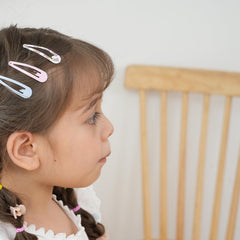cocplok clip securing toddler hair for comfortable wear