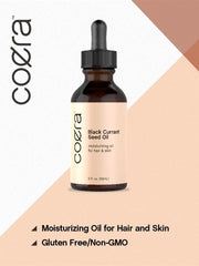 Coera oil applied to hair mid-lengths to reduce frizz and add shine