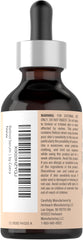 Coera retinol serum texture drop on fingertip demonstrating lightweight absorbency