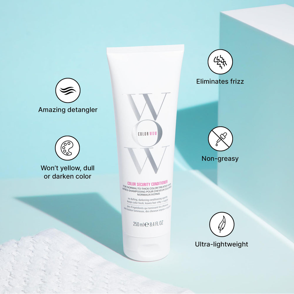 COLOR WOW conditioner texture spread on fingers showing lightweight slip and hydration