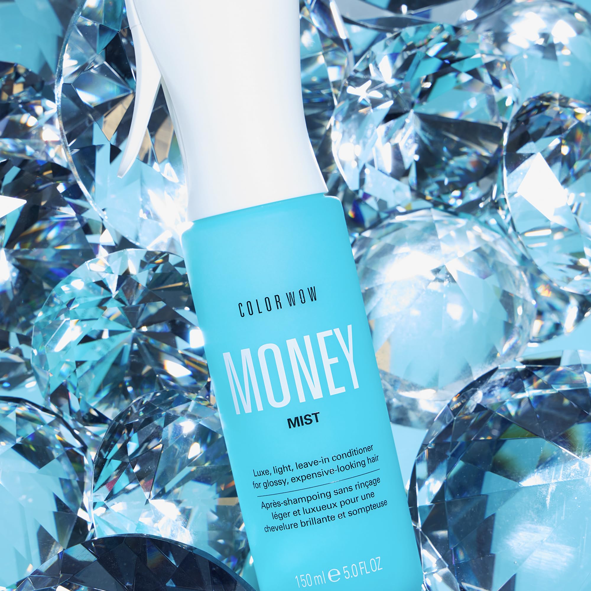 COLOR WOW spray action mist dispersing evenly for effortless detangling benefit