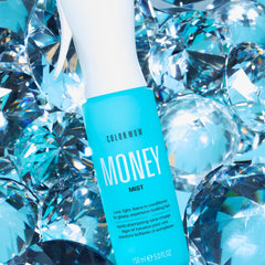 COLOR WOW spray action mist dispersing evenly for effortless detangling benefit