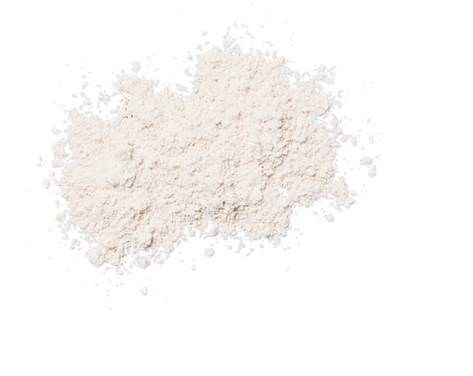 Colorescience brush open with visible bristles and powder for easy touch-ups