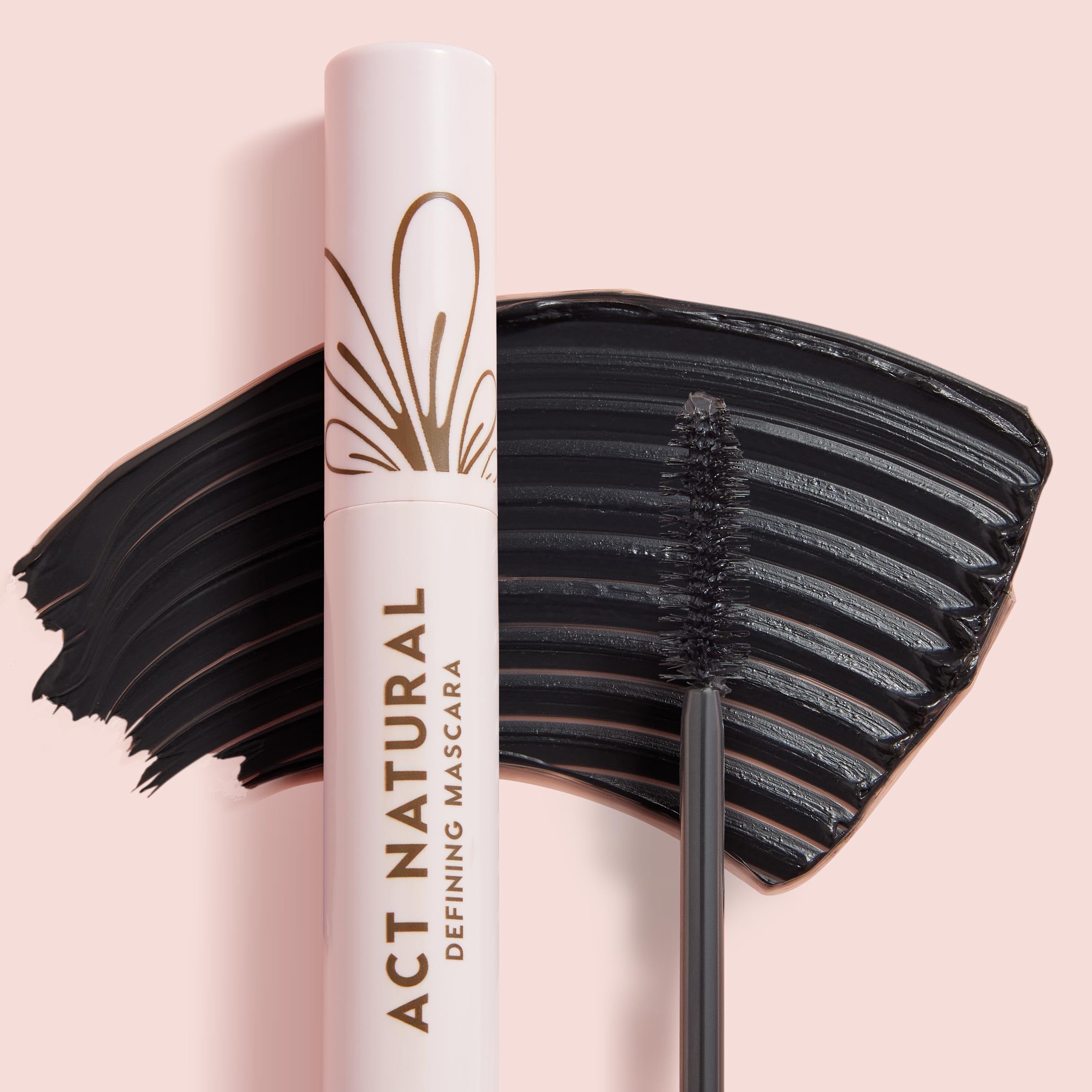 ColourPop Act Natural tube held in hand for scale, compact travel-friendly mascara size