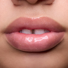 ColourPop applied on lips demonstrating pearlescent shimmer and plump look benefit