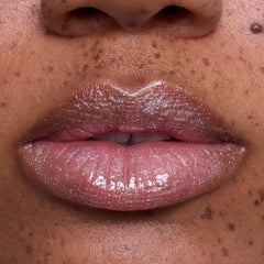 ColourPop Bright Ariel gloss on lips showing vibrant color and glossy finish benefit