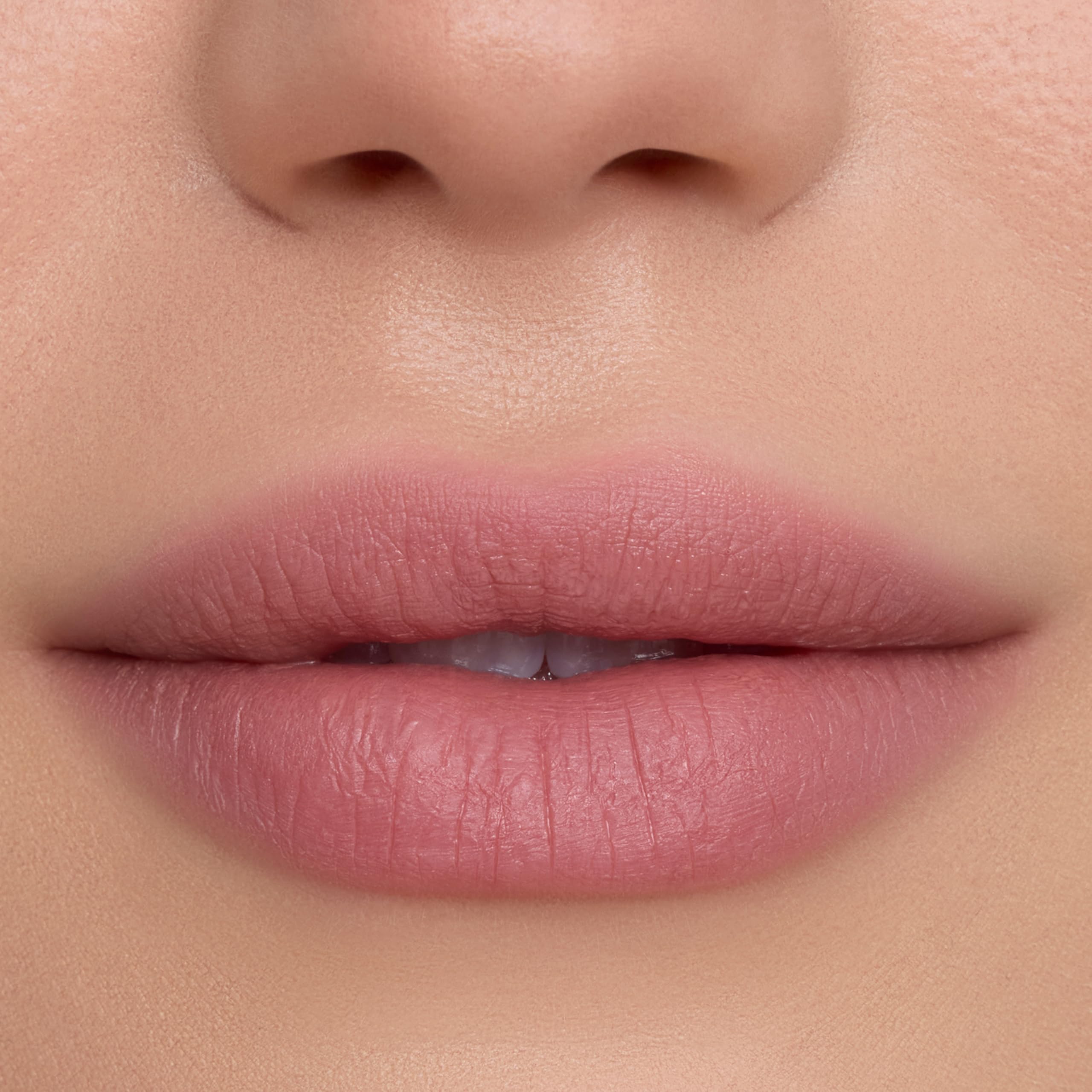 ColourPop Cloud Whip applicator close-up, showing soft wand for smooth application
