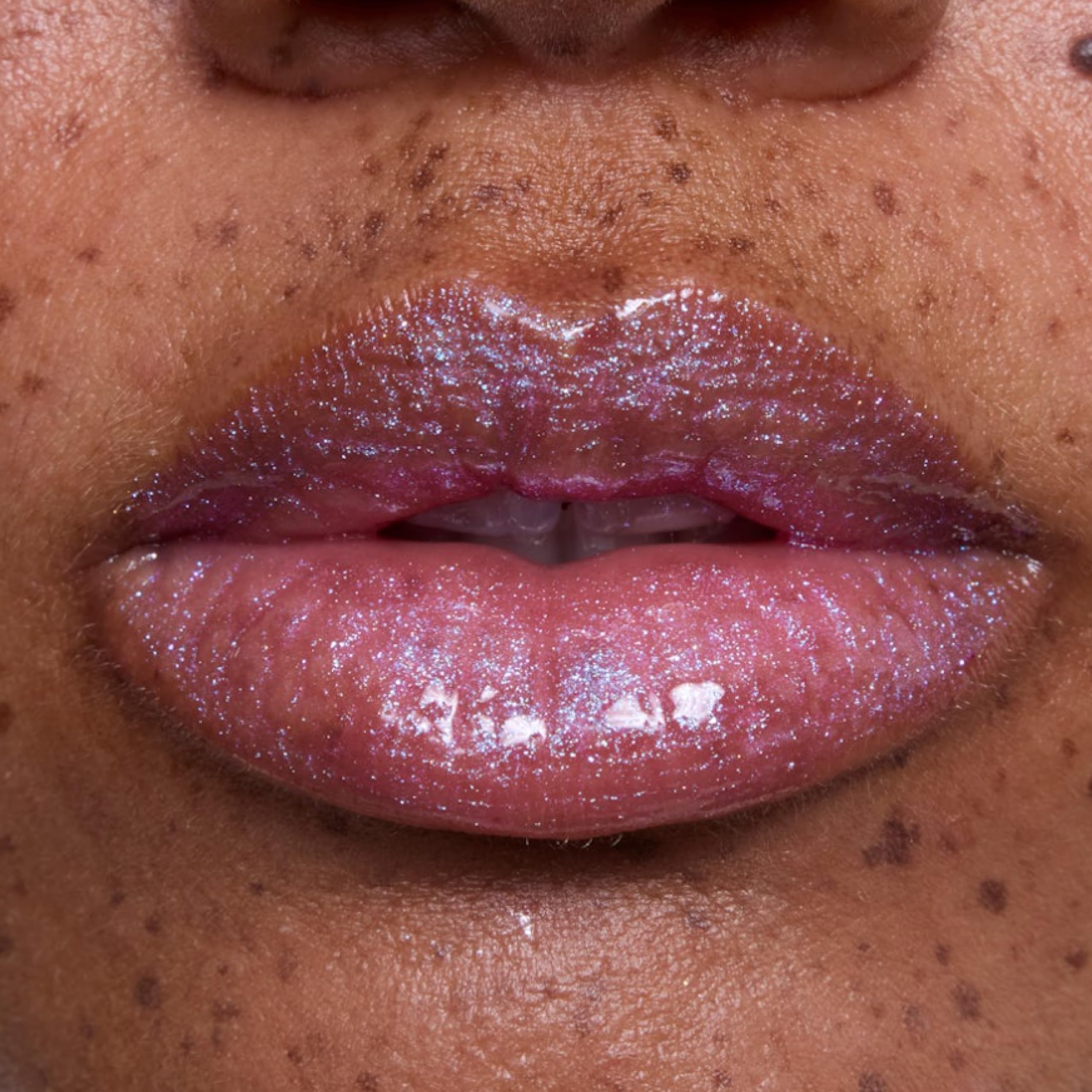 ColourPop model wearing Courageous Rapunzel showing radiant lips and everyday glam