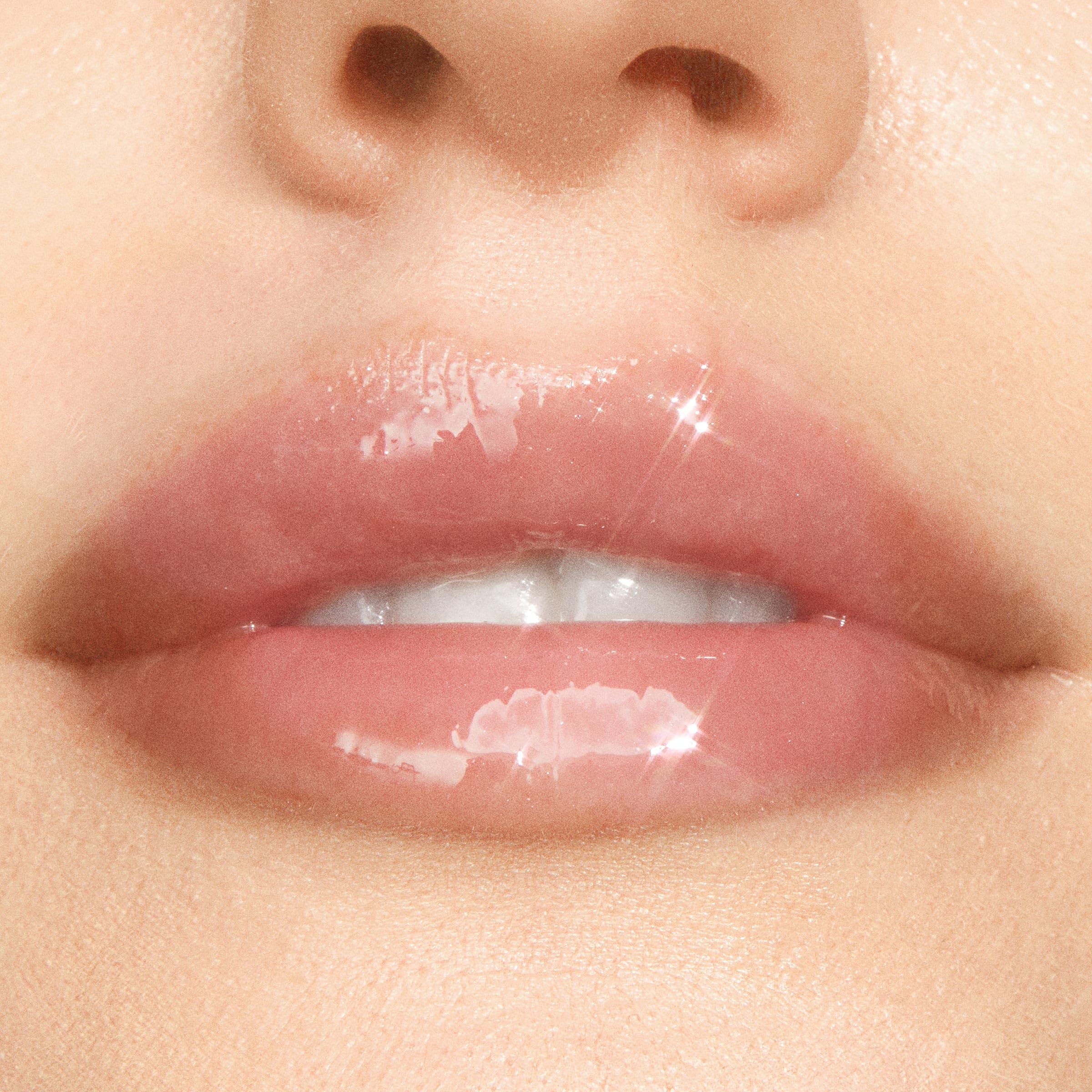 ColourPop gloss applicator displaying plush doe-foot for smooth, even glossy coverage