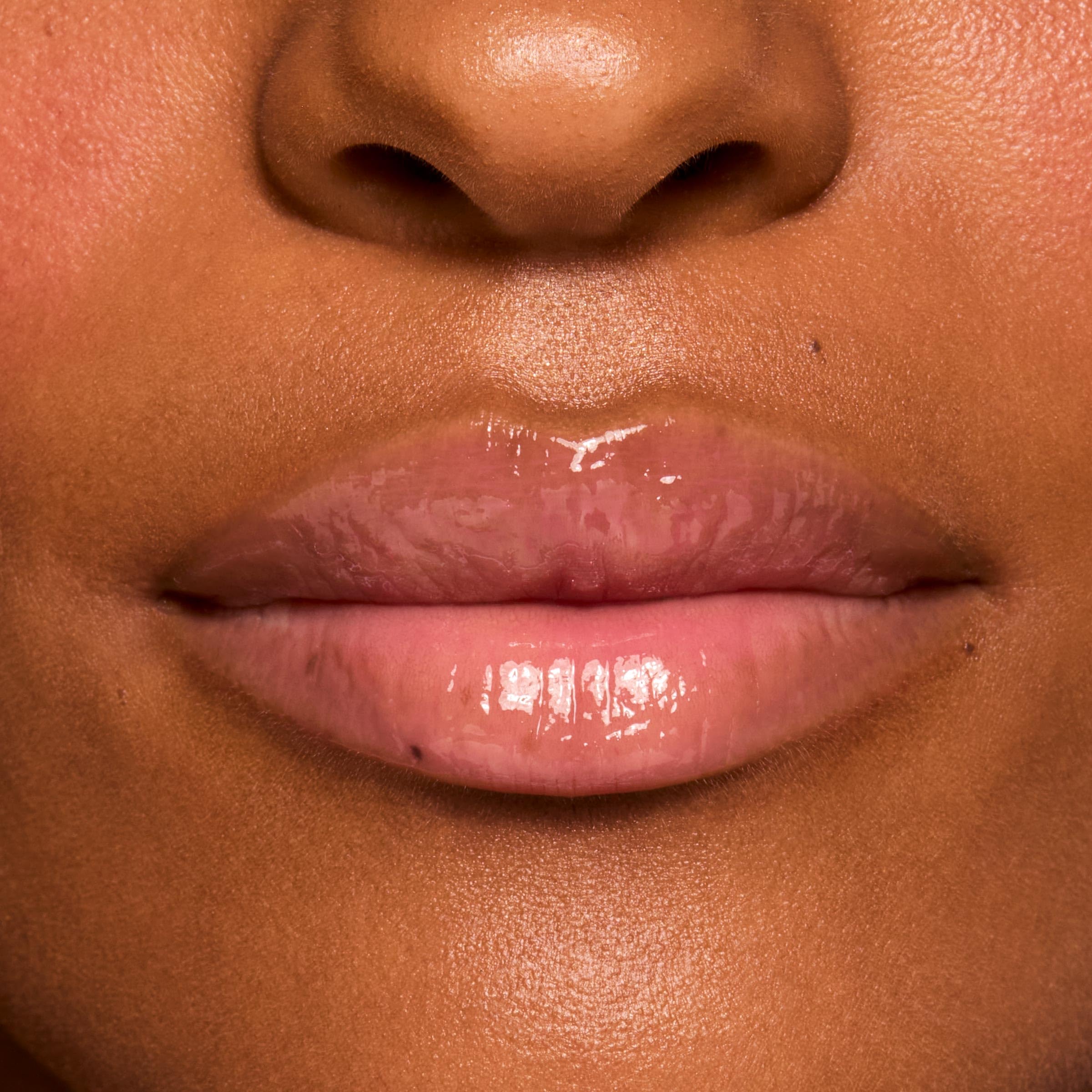 ColourPop ingredient label closeup highlighting hyaluronic acid and peptides benefit