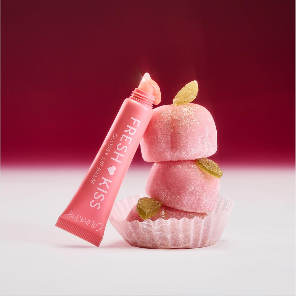 ColourPop Fresh Kiss in a peach-themed lifestyle scene showing scent suggestion benefit: inviting fragrance