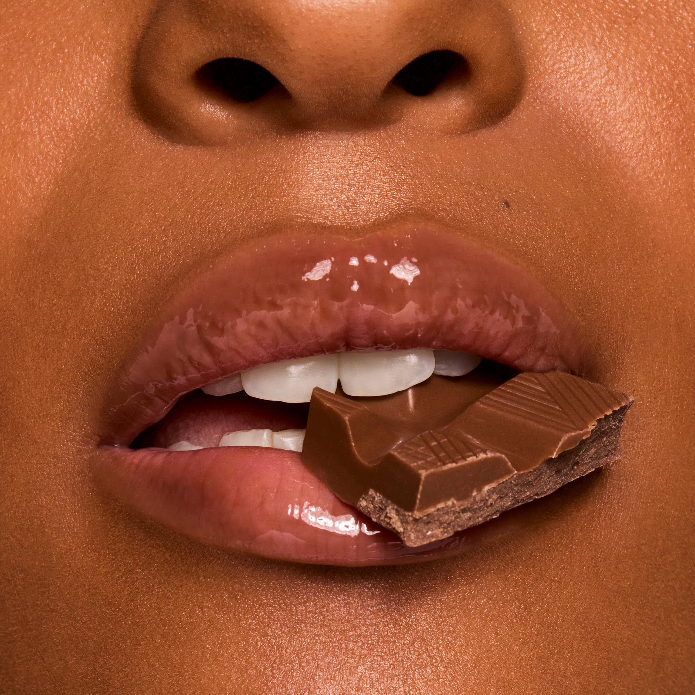 ColourPop gloss on lips Chocolate Milkshake showing sheer brown tint and shine