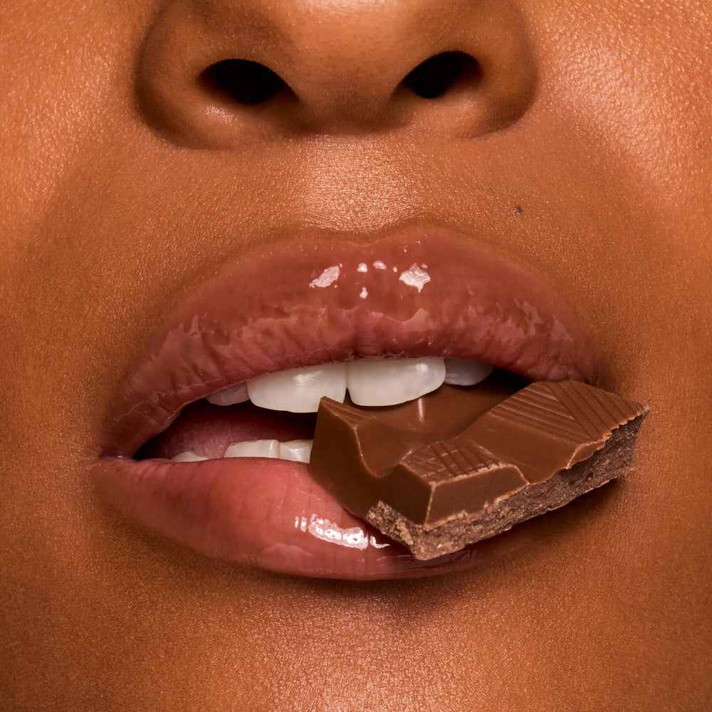 ColourPop gloss on lips Chocolate Milkshake showing sheer brown tint and shine