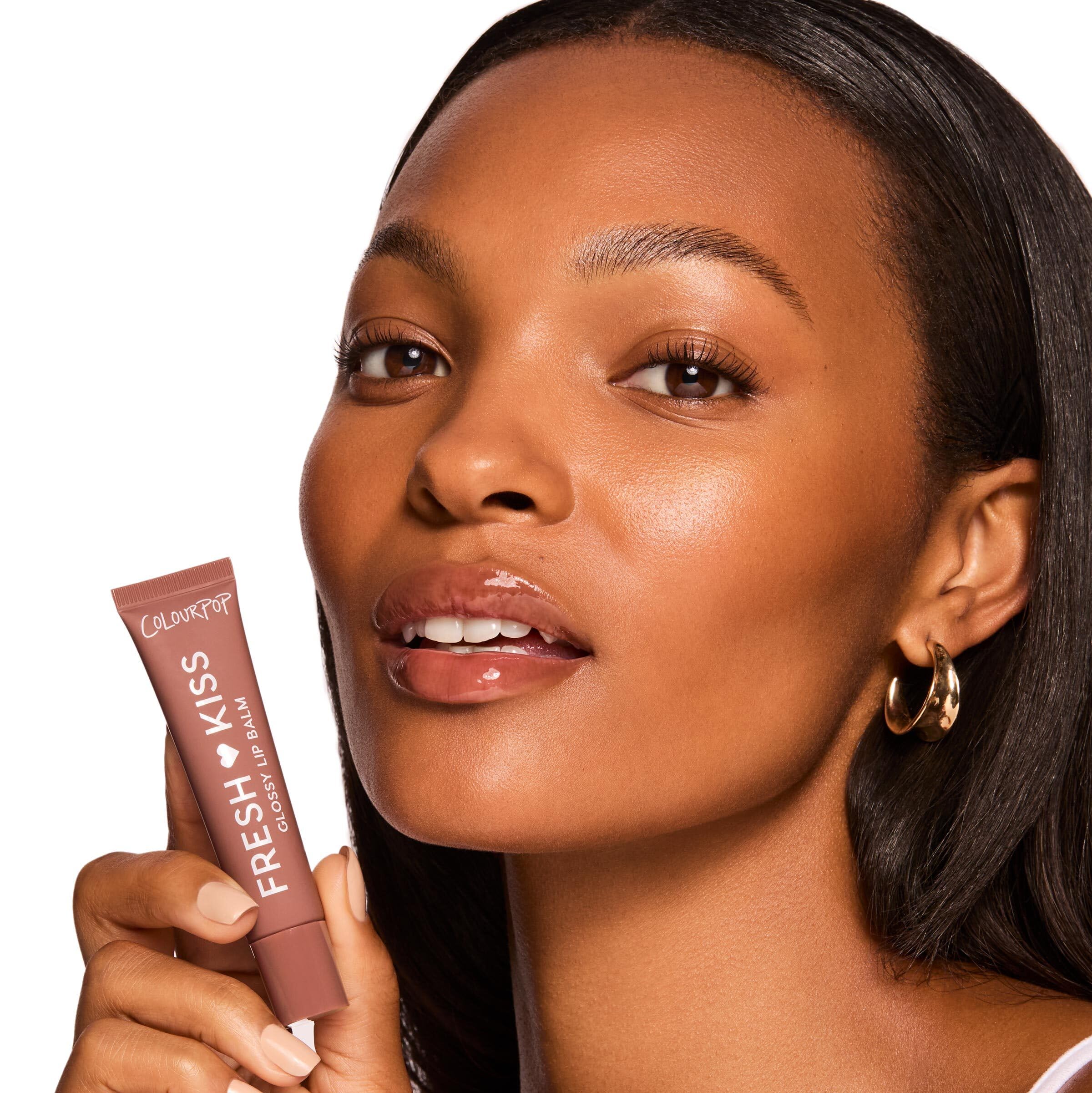 ColourPop close-up of gloss texture highlighting smooth, cushiony hydration