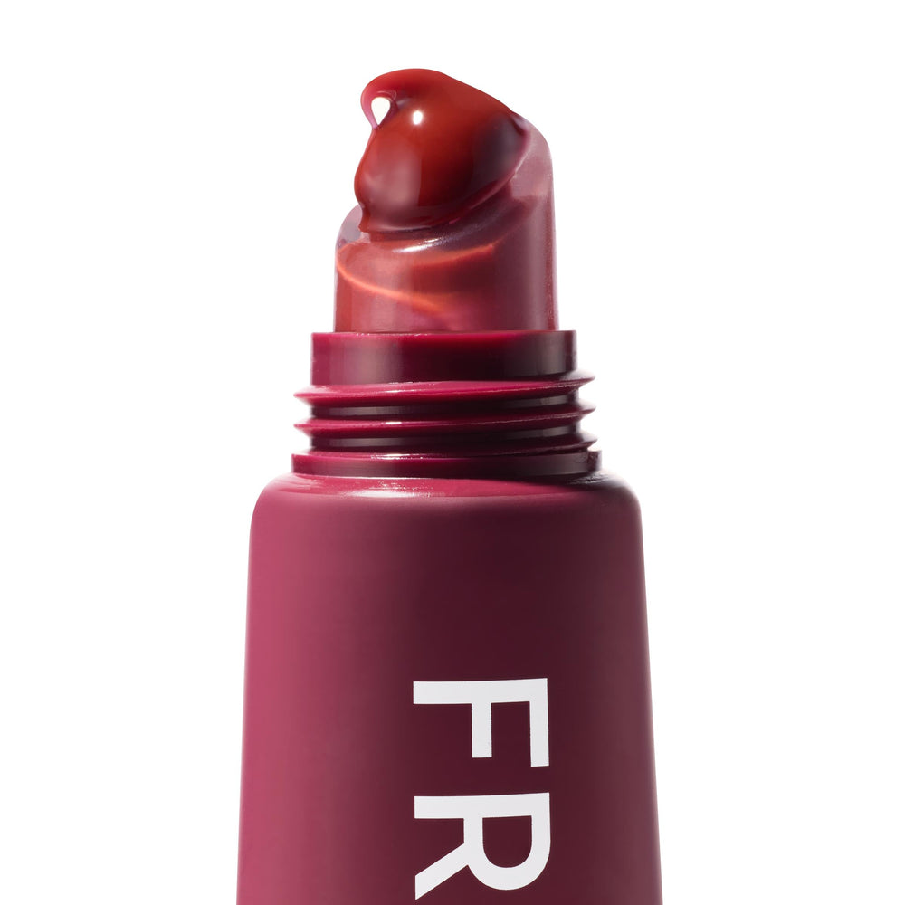 ColourPop Fresh Kiss Wild Berry in a handbag lifestyle for convenient touch-ups benefit