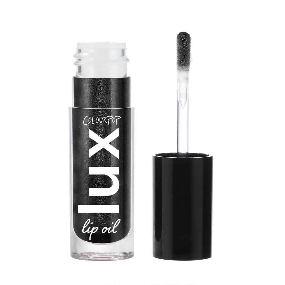 ColourPop front packaging of Team Jacob lip oil showing glossy tube and branding benefit shine
