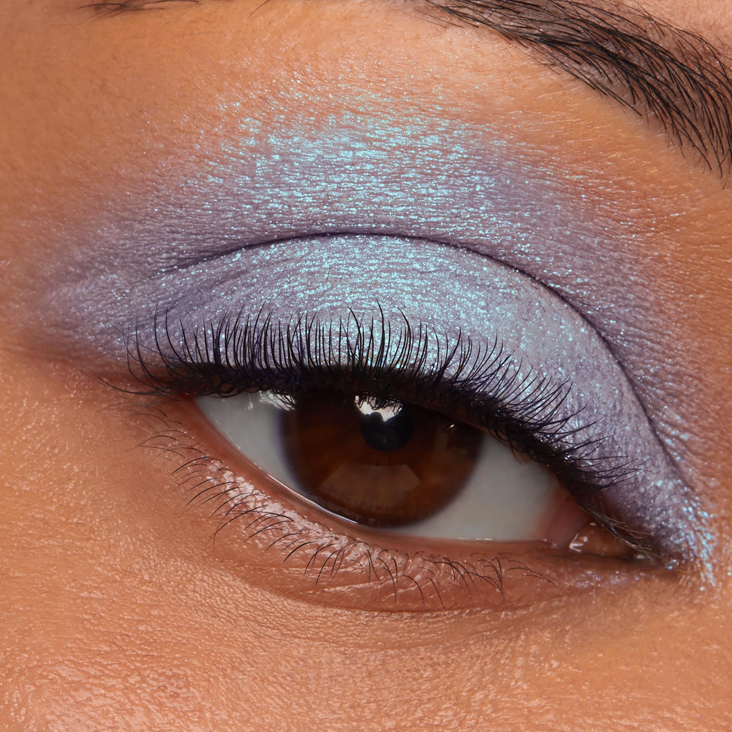 ColourPop Hallucinogenius swatch on arm demonstrating intense one-swipe pigment payoff