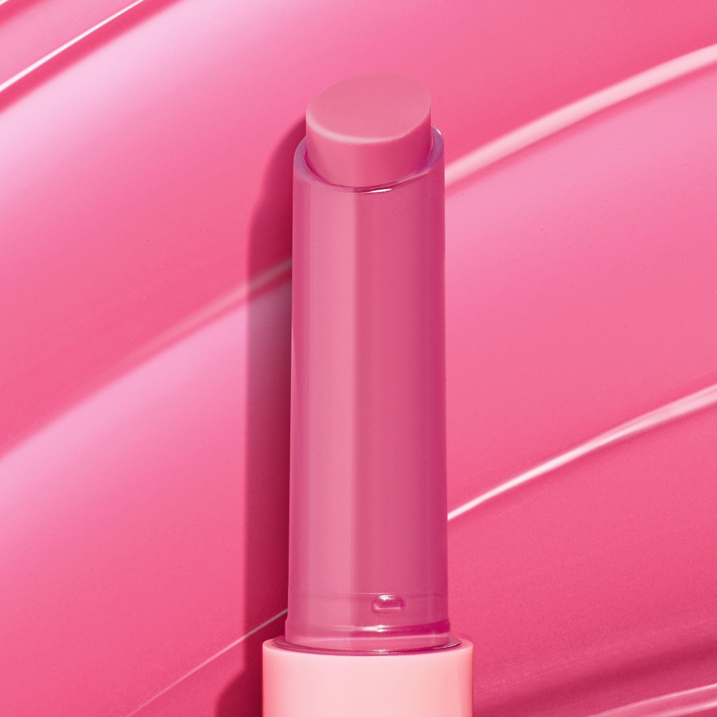 ColourPop in a purse by mirror showing easy on-the-go touch-up benefit