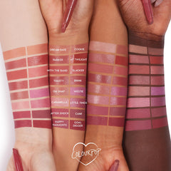 Hand holding ColourPop Lippie Stix Little Tings to show compact size and travel convenience