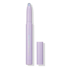 ColourPop Shadow Stix next to a lipstick showing compact size for travel convenience