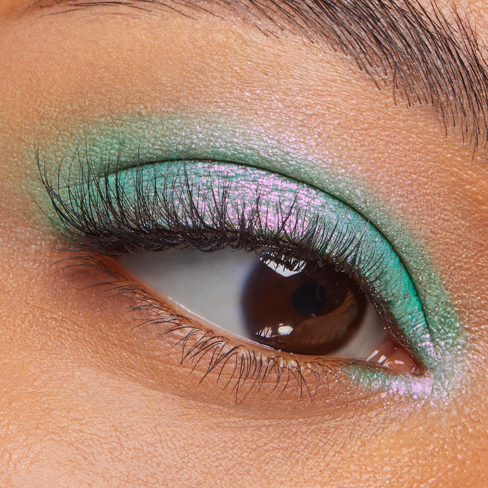 ColourPop Solar Beam applied on eyelid swatch showing vibrant sparkle payoff