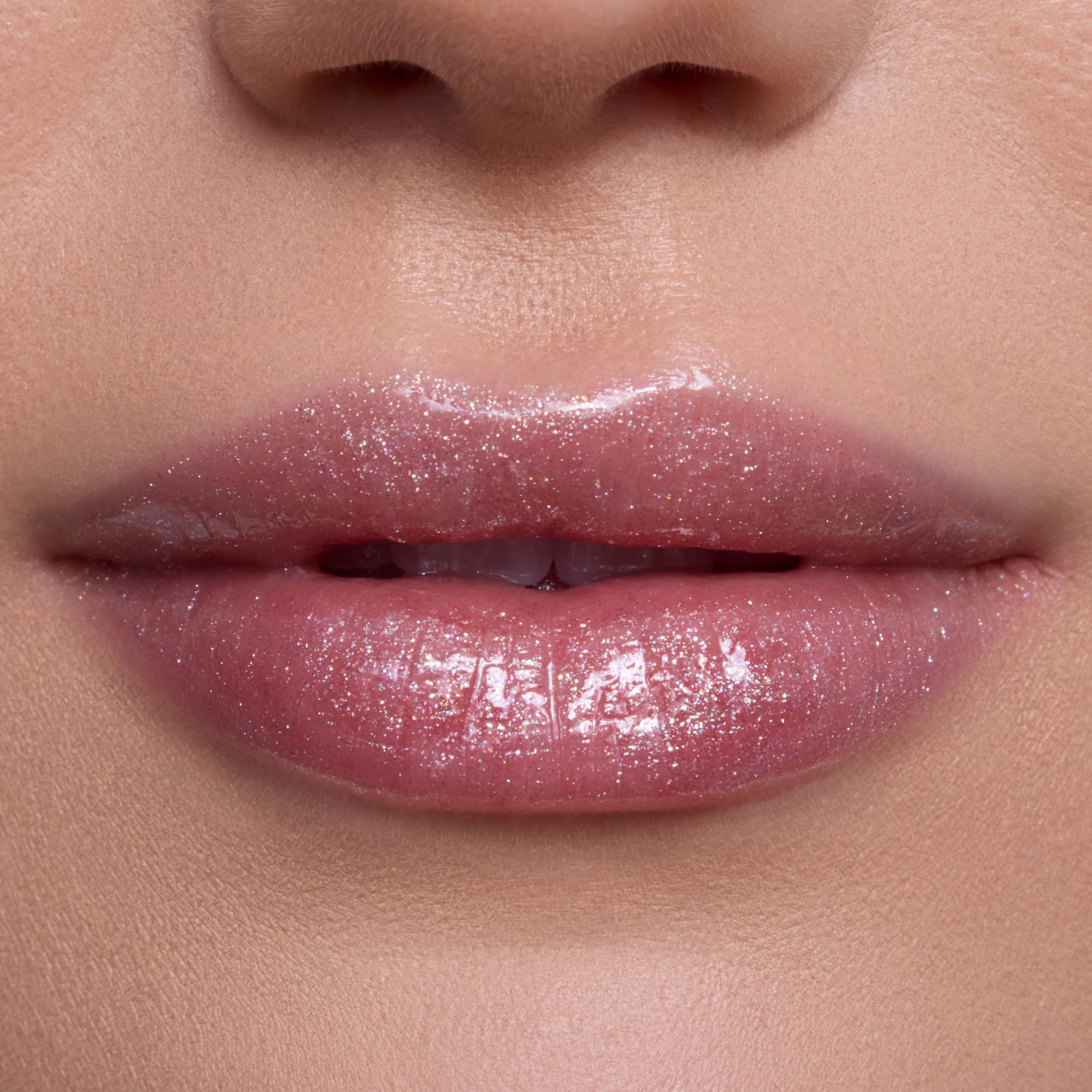 ColourPop Sparkling Opal swatch on skin showing pearlized shimmer and glow benefit