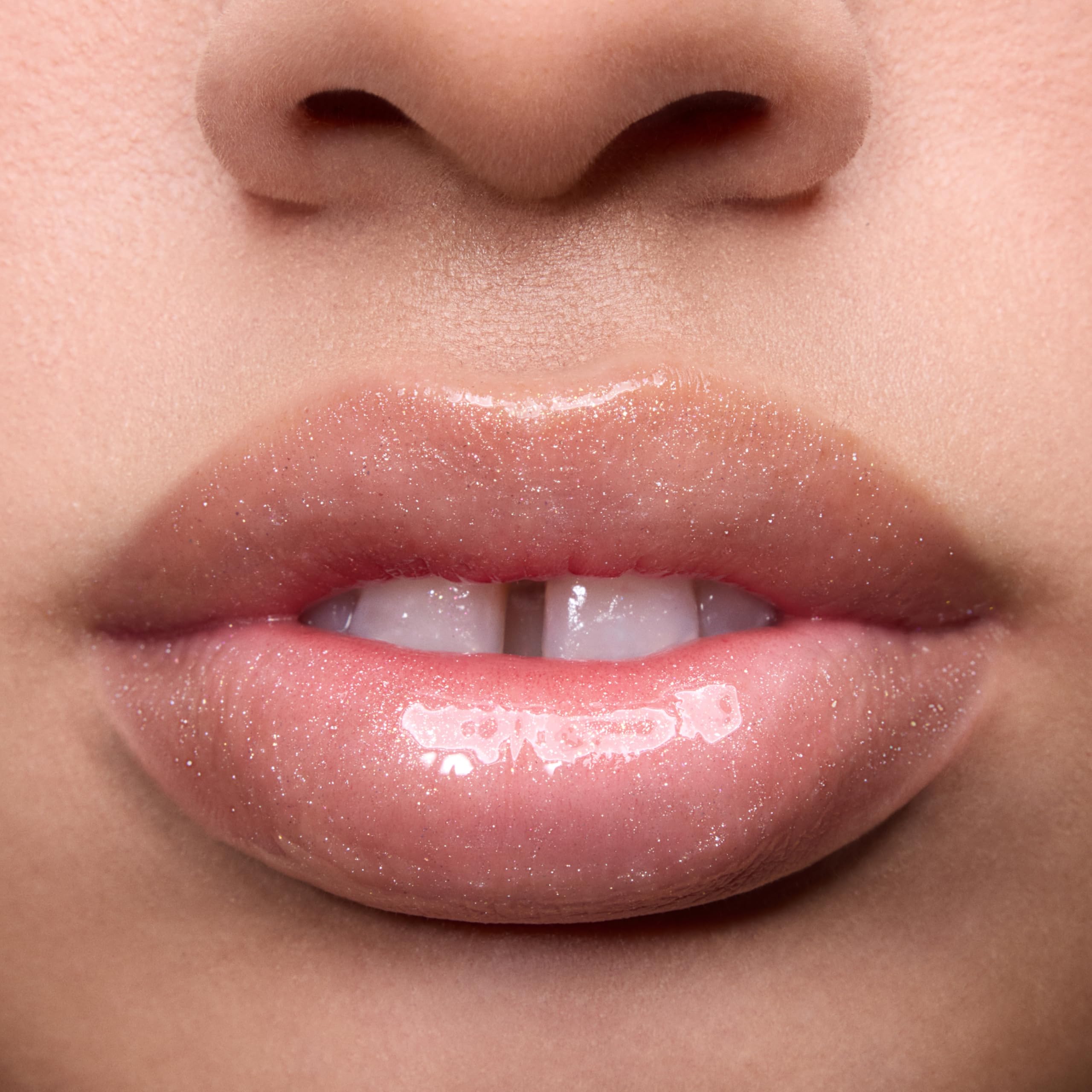 ColourPop layered over lipstick showing added shine and dimension benefit