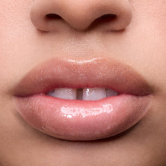ColourPop layered over lipstick showing added shine and dimension benefit