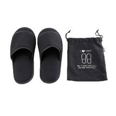 Comfysail front view folded slippers with bag showing compact packing benefit