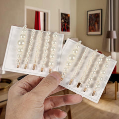 COMNICO clips held in hand to show size and easy portable convenience