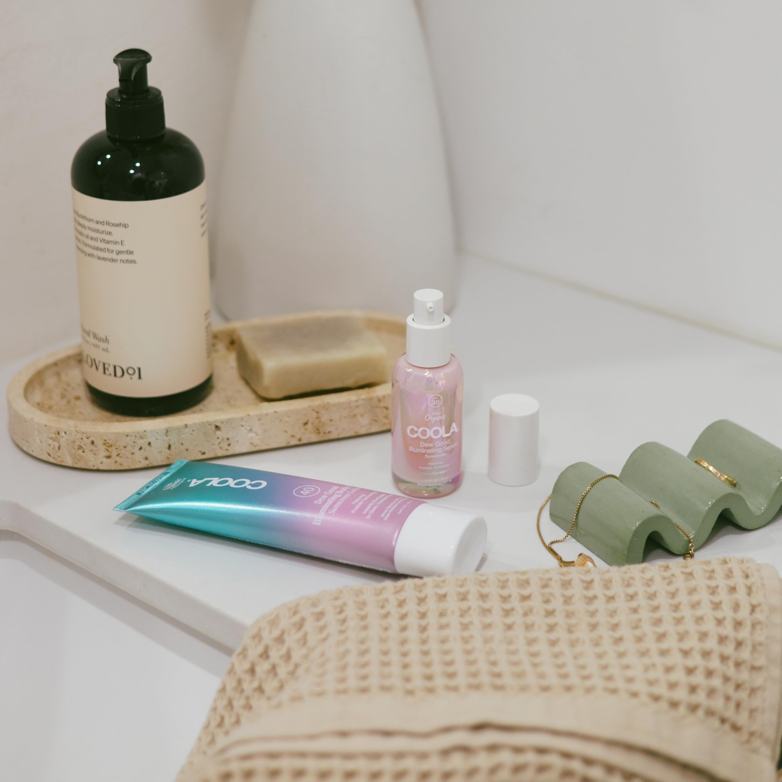 COOLA pump dispensing serum illustrates easy controlled application benefit