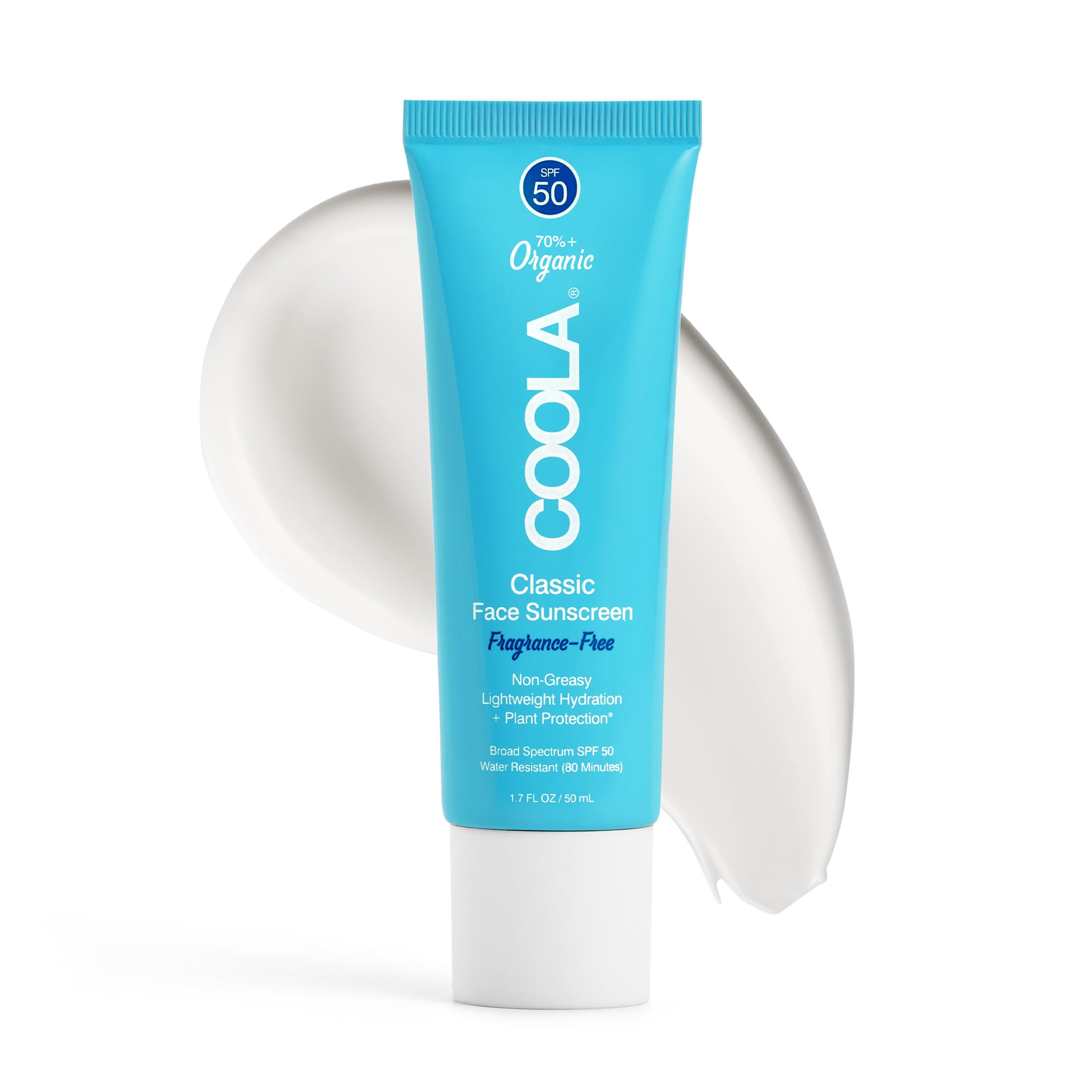 COOLA front tube showing sunscreen branding and compact size for travel