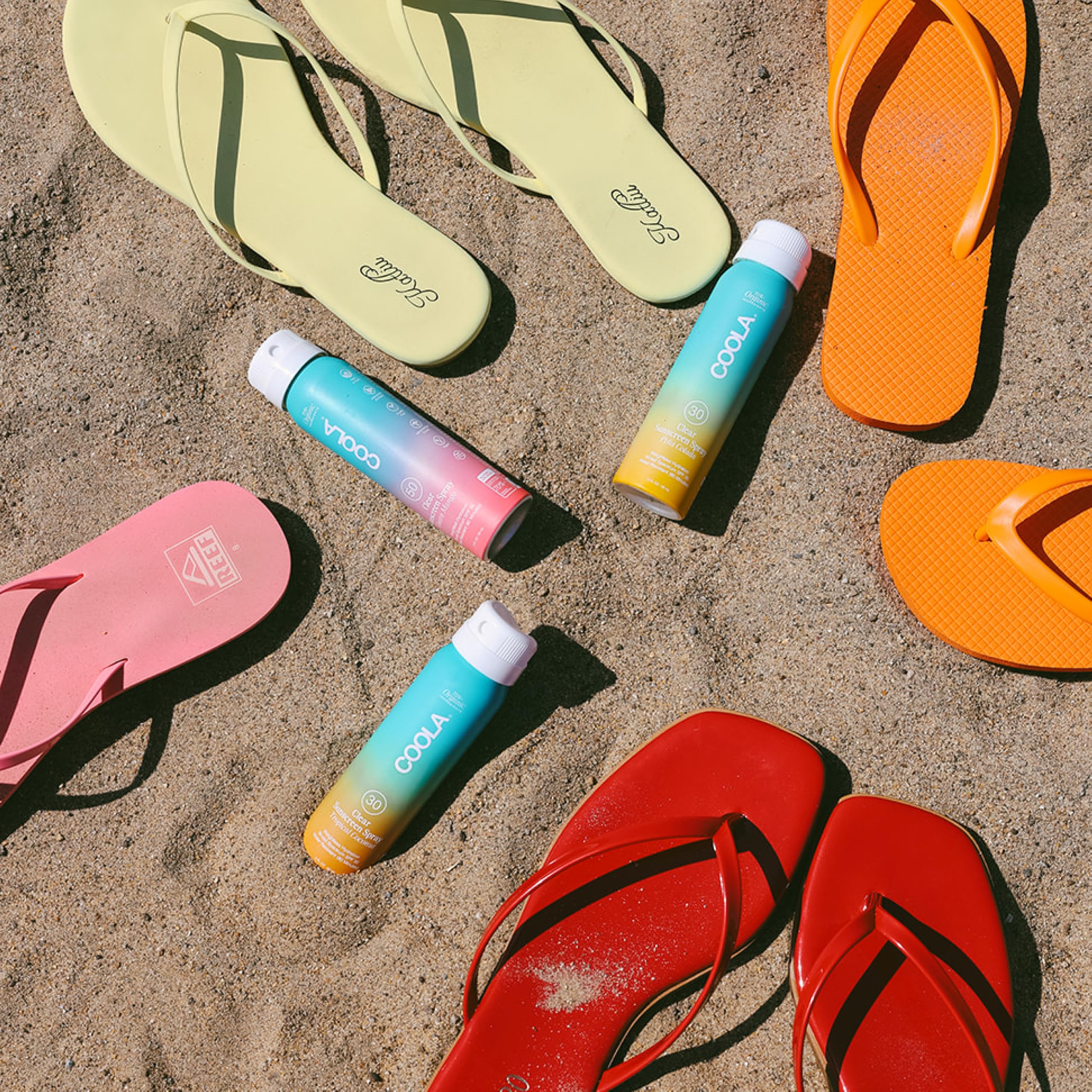 COOLA applied at beach scene for on-the-go sun protection