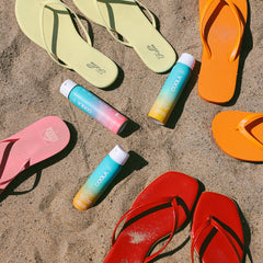 COOLA applied at beach scene for on-the-go sun protection